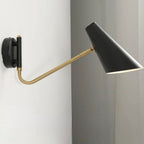 Black conical shade and gold adjustable arm wall light, LED-compatible, modern industrial design.