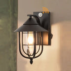 Black metal lantern sconce with clear glass, motion sensor, orange Wi-Fi icon, IP65 rating.