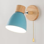 Blue-shaded Scandinavian wall light with wooden base, pull chain, and 360° rotation.