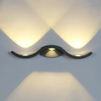 Curved black LED wall light with warm white up-and-down triangular beams, IP65 rated.