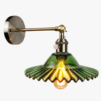 Soft accent lighting shines through creped green glass, creating warm, vintage-inspired illumination.