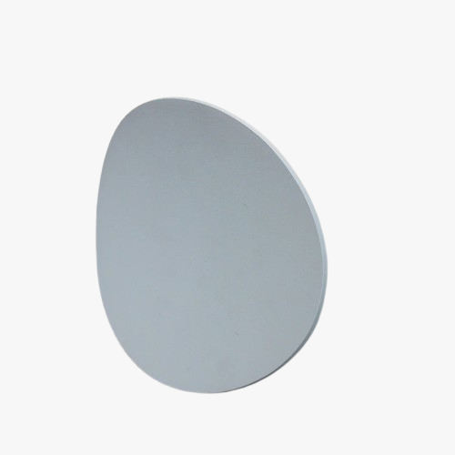 This circular LED light emits soft, even illumination for modern minimalist spaces.