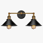 Enjoy warm, focused illumination from double cone-shaped shades and brass arms with vintage flair.