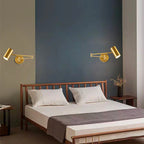 Gold aluminum wall light with E27 socket mounted on color-blocked green and dark blue wall.