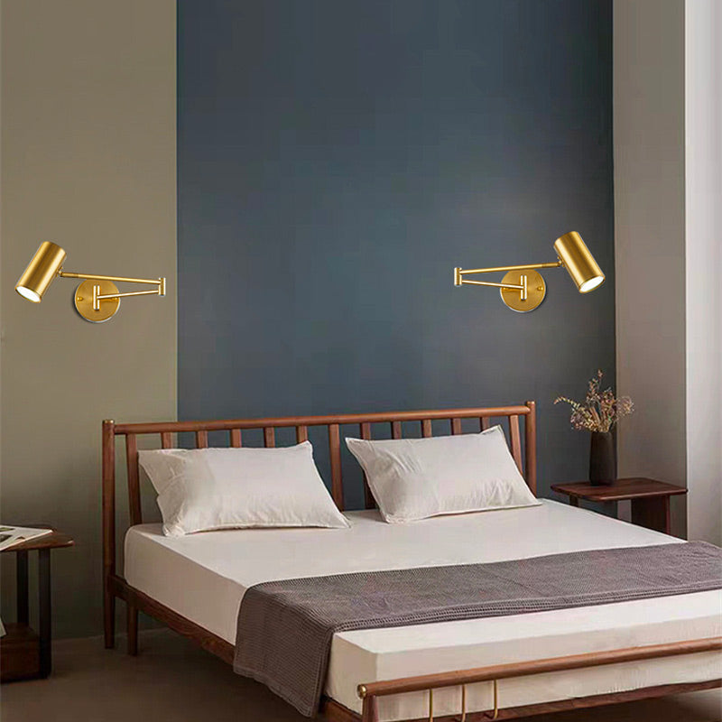 Gold aluminum wall light with E27 socket mounted on color-blocked green and dark blue wall.
