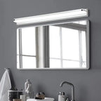 Applique murale LED design épuré en acier inoxydable moderne fixée au mur gris.