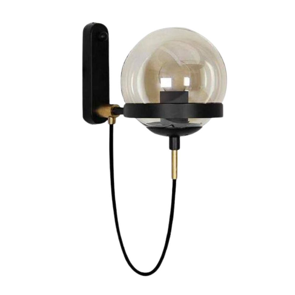 Industrial retro wall light with round clear glass globe, black bracket, and visible cord.