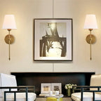 LED Staircase Wall Light with a modern metal grid design illuminates abstract wall art.