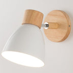 Minimalist wall light with round wood base, metal details, and white cone shade; 360° rotatable.