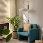 Luminaire boule design japonais, soie et acier inoxydable, éclaire doucement la salle de bain.