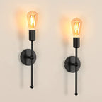 Deux appliques murales modernes noires à LED en métal et acrylique, éclairage chaud.