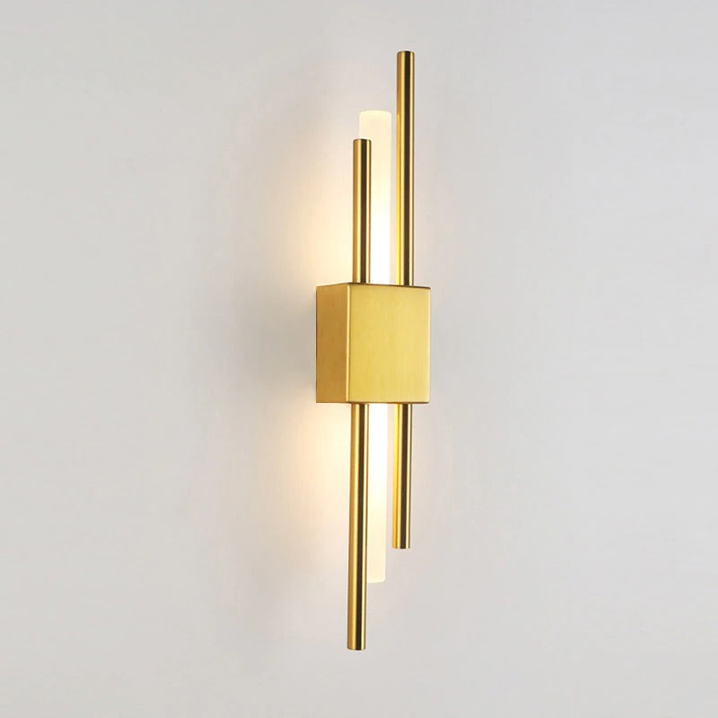 Sleek black and gold metal kitchen wall light with warm LED glow from behind.