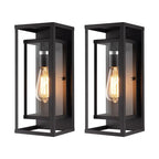 Sleek black metal outdoor wall light with clear panels and exposed Edison bulb, IP65-rated.