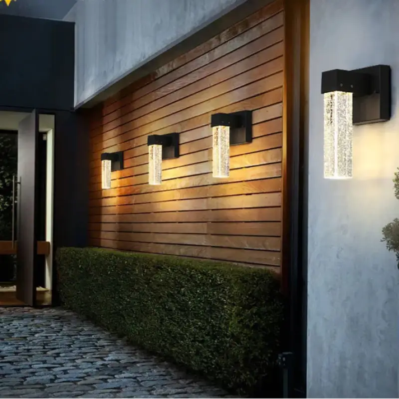 Sleek crystal aluminum wall sconce emits soft, inviting light with a gentle, modern glow.