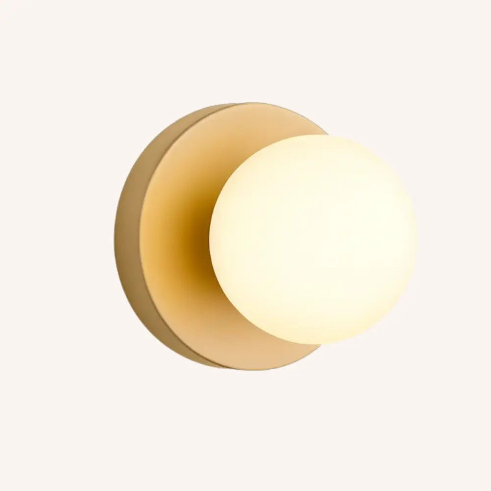 A glowing opal glass globe LED lamp radiates soft, modern Scandinavian-style illumination.