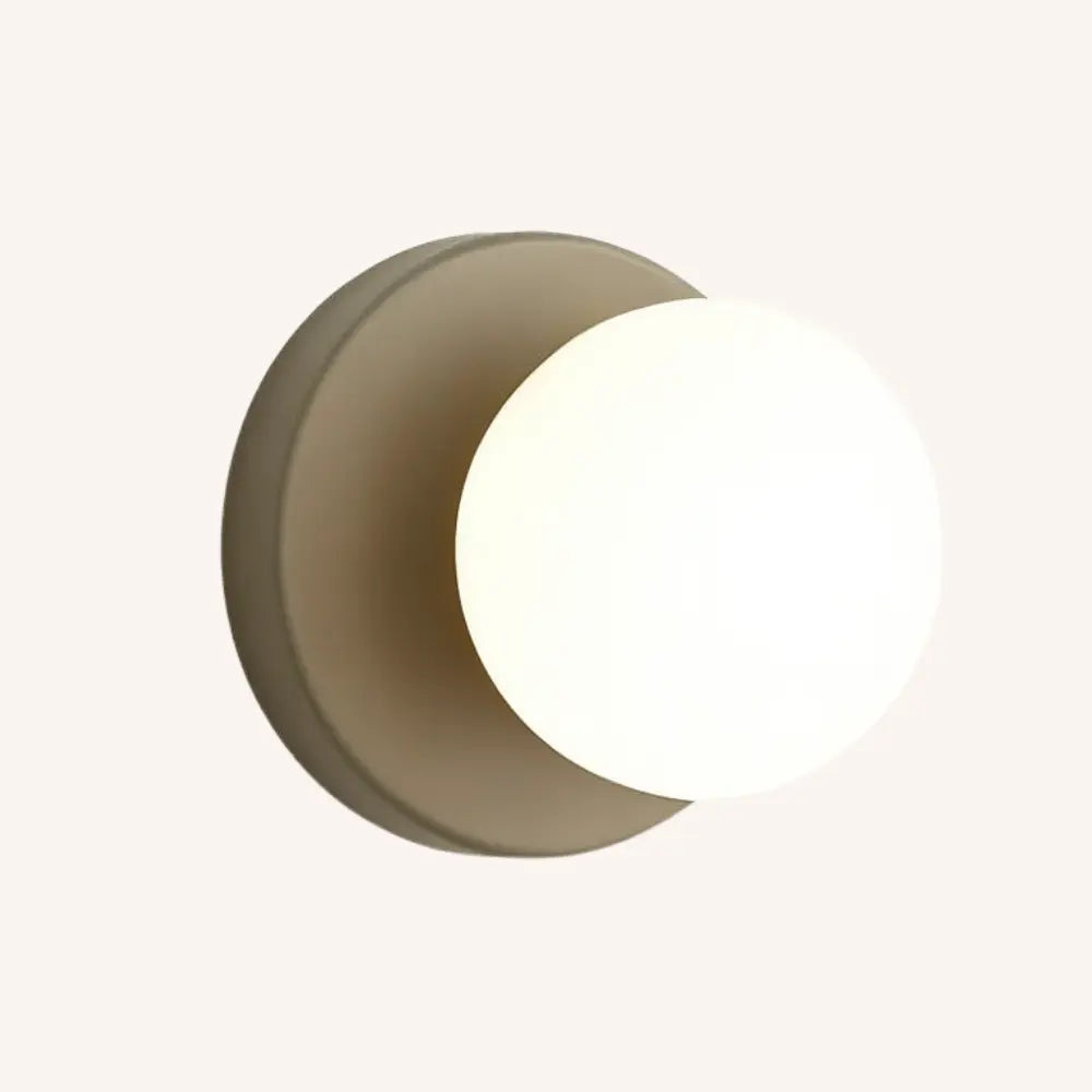 Glowing opal glass globe provides soft, modern Scandinavian-style lighting for your space.