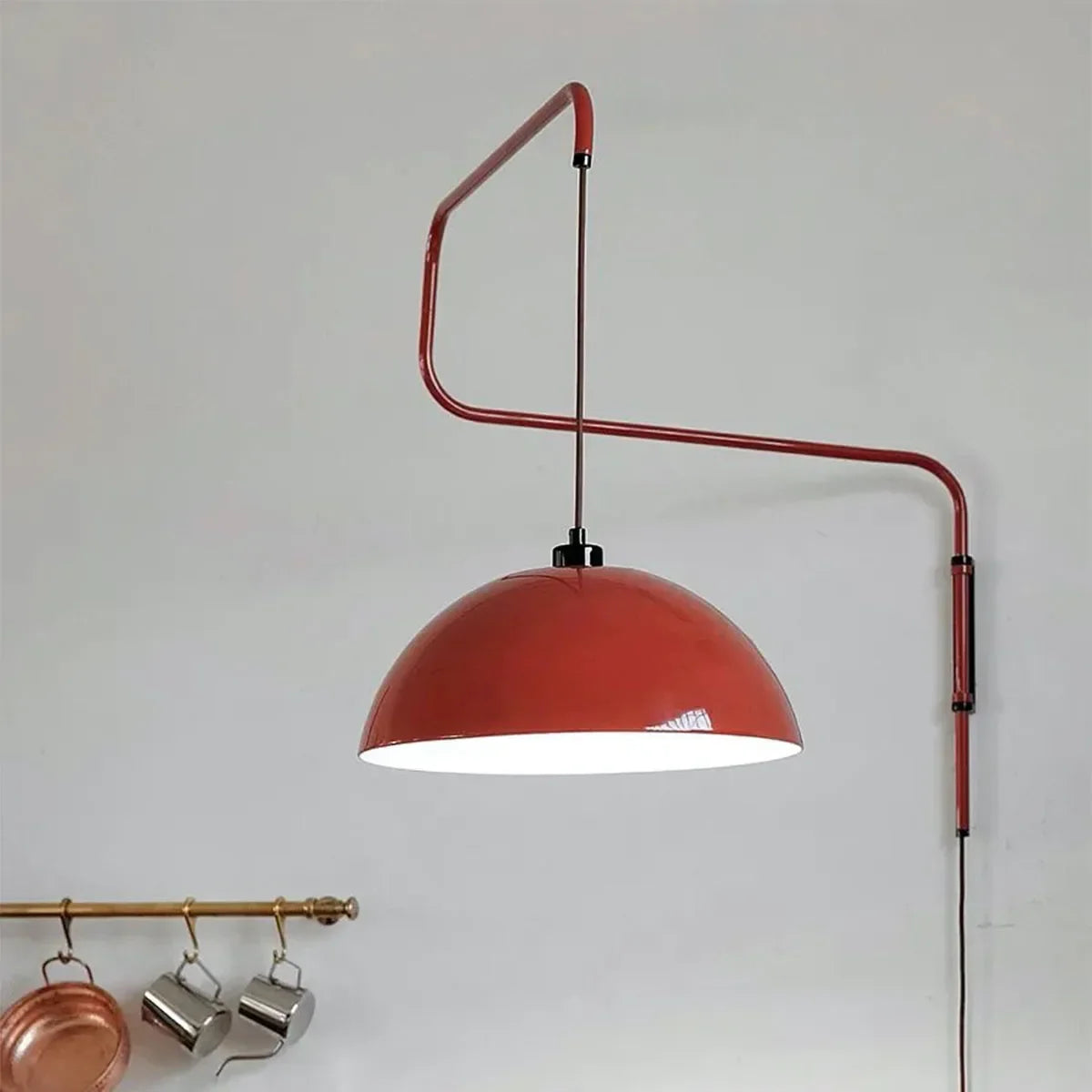 The lamp’s adjustable arm bathes the kitchen in beautiful, focused, golden light.