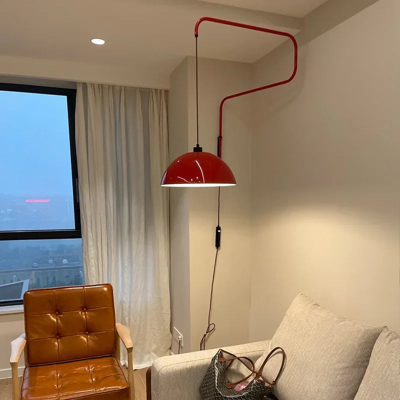 This Nordic wall lamp’s adjustable arm lets you direct warm light exactly where needed.