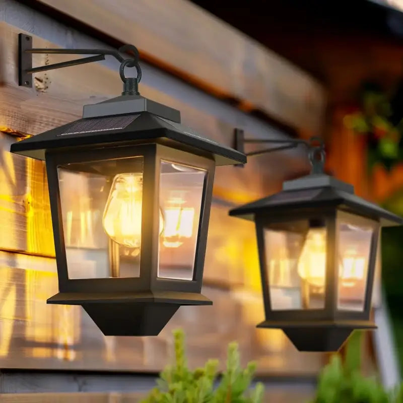 Vintage aluminum wall lantern with tempered glass and dusk sensor, glowing warmly at twilight.