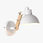 Wall-mounted LED wall light with white metal finish, wood shade, round base, visible cord.