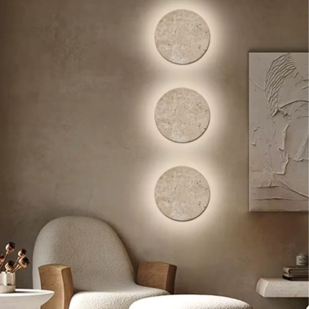 Three ORLUNE HOME Artistic LED Wall Lights glow vertically, adding vibrant illumination to walls.