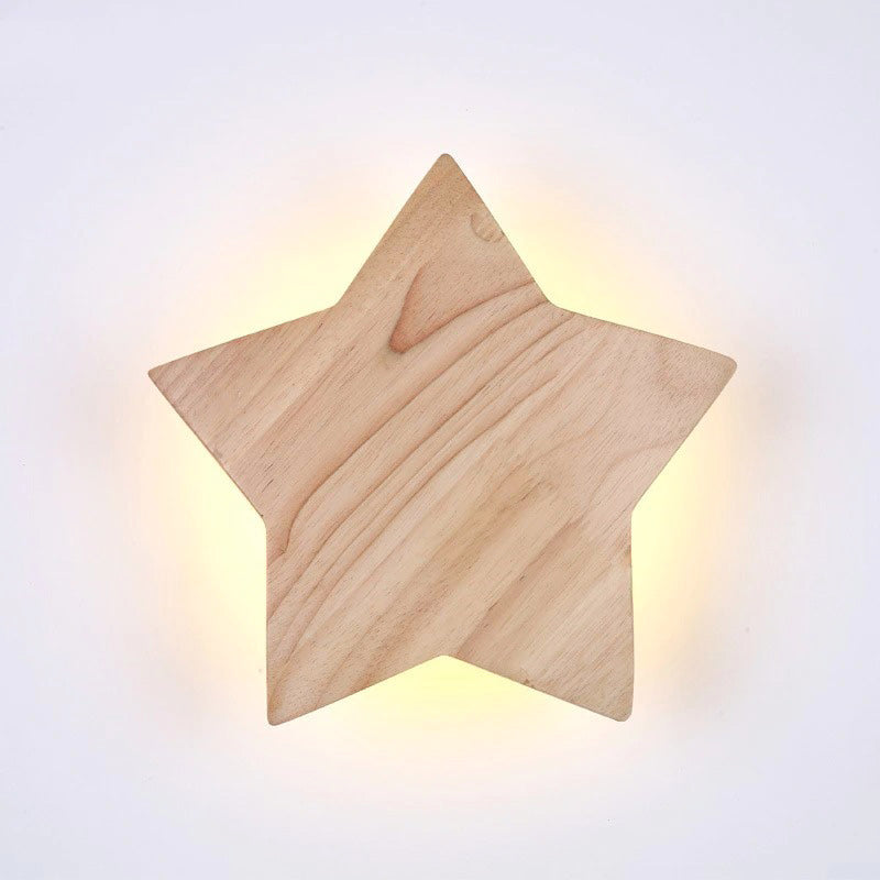 Soft yellow light softly radiates from the star-shaped fixture, brightening children’s rooms gently.