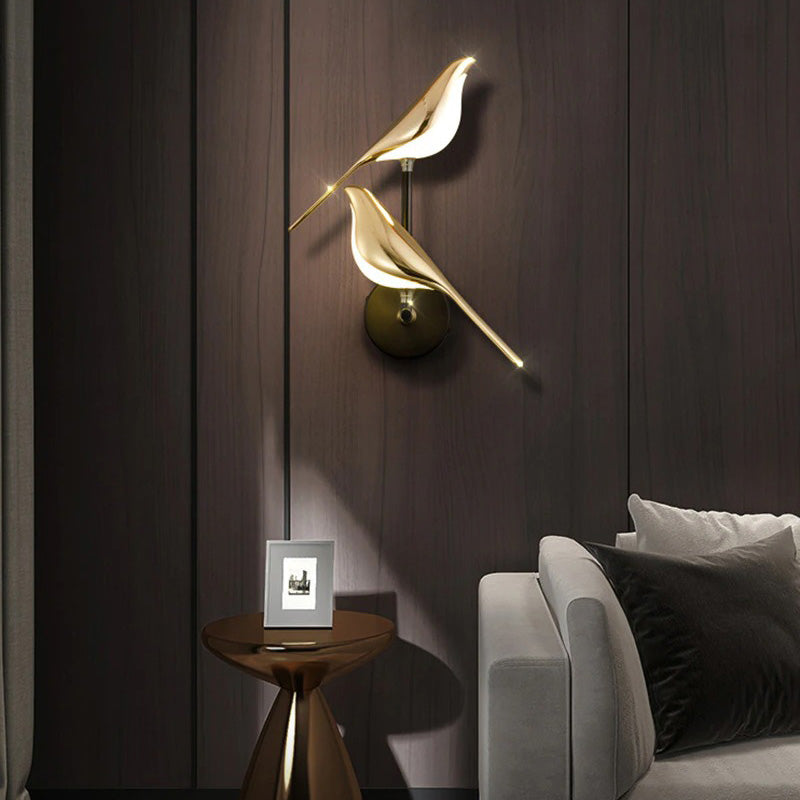 ORLUNE HOME Golden Bird Staircase Wall Light bathes the room in warm, soft illumination.