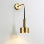 Experience elegant, focused lighting with ORLUNE HOME’s gold wall lamp and black cord.