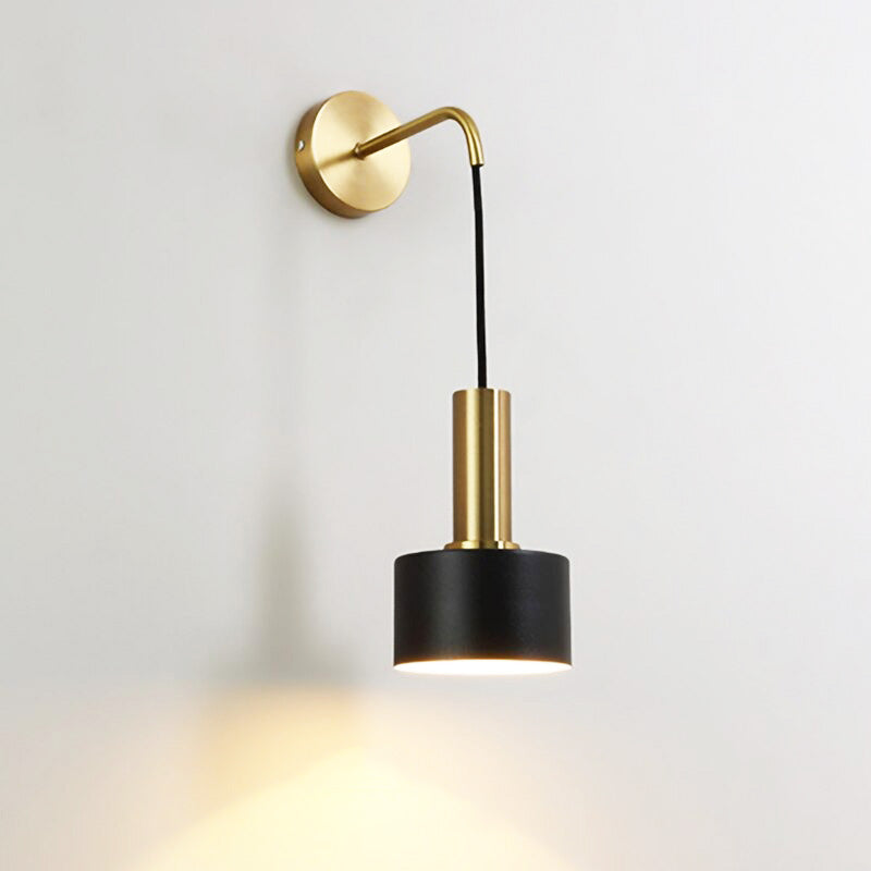 Features downward accent lighting with a gold fixture and black shade—perfect for modern illumination.