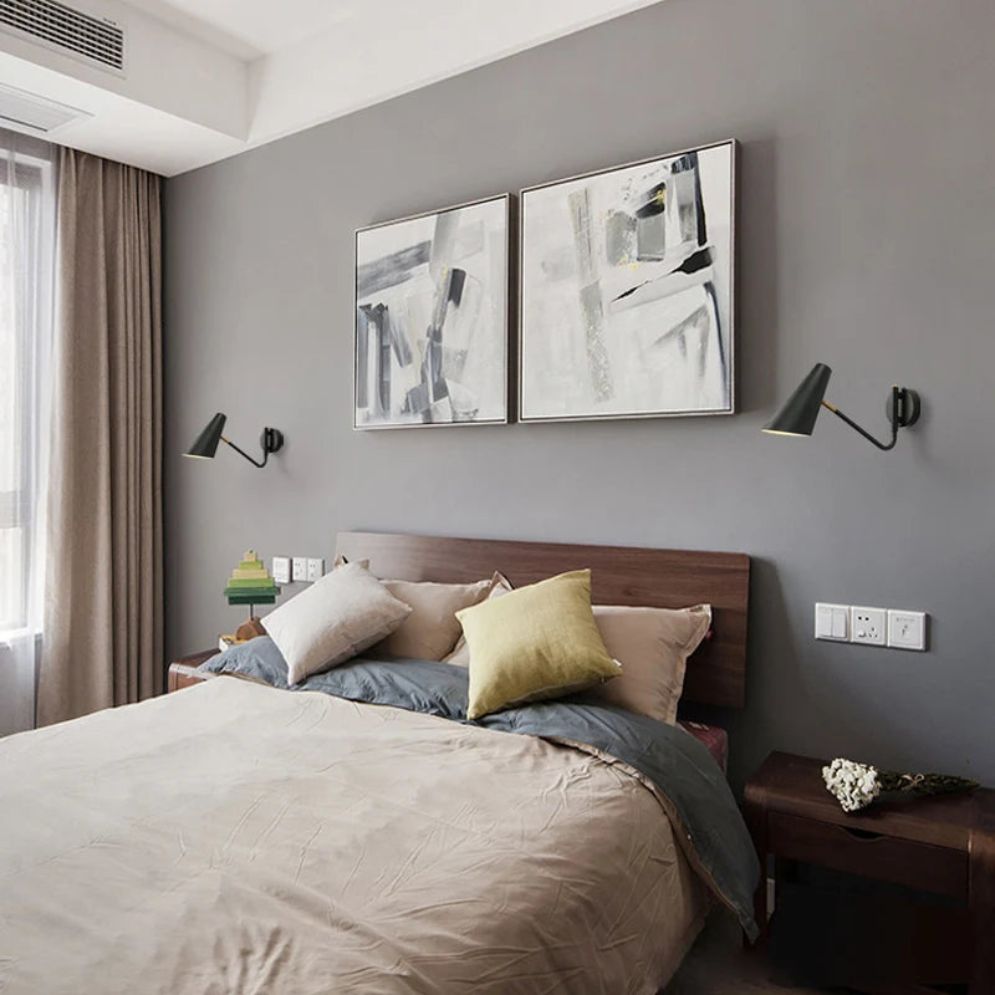 ORLUNE HOME Adjustable Industrial LED Wall Lights cast a soft glow on abstract art.