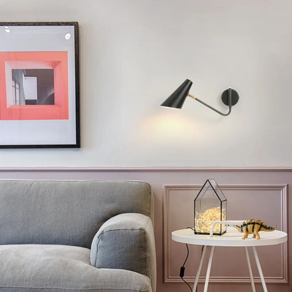 ORLUNE HOME adjustable industrial LED wall light adds sleek, modern illumination to the space.
