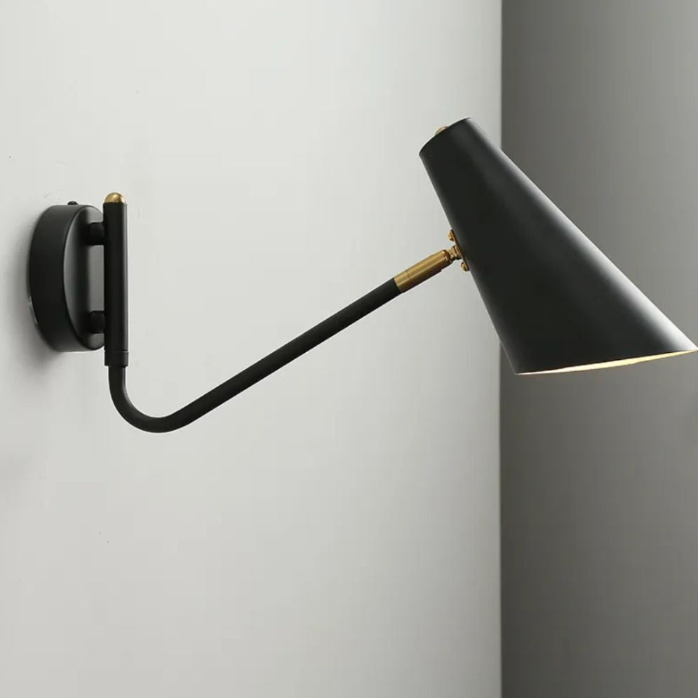 Sleek black LED wall light delivers focused, stylish illumination for modern interiors.