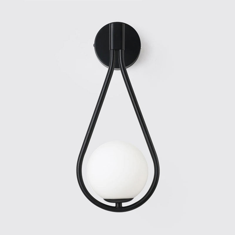 Minimalist LED moon wall light offers soft, modern illumination with sculptural elegance.