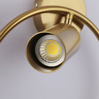 Elegant LED wall light emits a soft, luxurious gold glow with sleek cylindrical design.