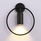 Integrated LED lighting casts a warm downward glow with modern circular and cylindrical style.