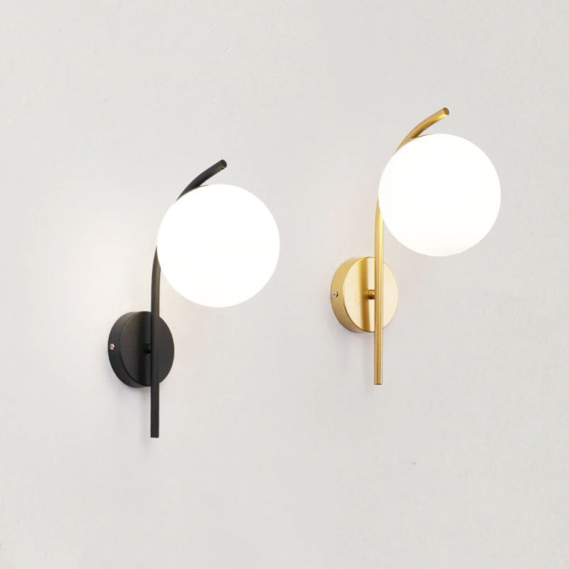 Modern LED moon lights with frosted globes emit soft, ambient kitchen illumination.