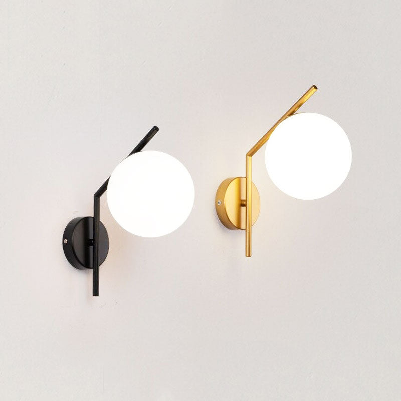Brighten your kitchen with soft LED light from stylish Moon Design round wall fixtures.