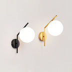 Brighten your kitchen with soft LED light from stylish Moon Design round wall fixtures.