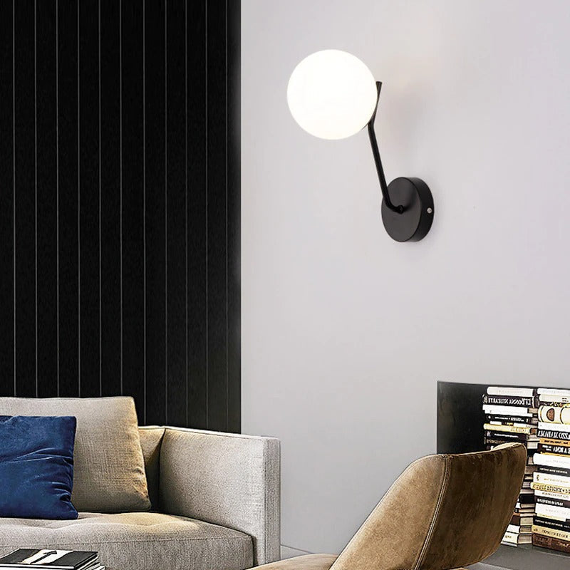 The ORLUNE HOME LED Wall Sconce casts a soft, inviting glow against the wall.