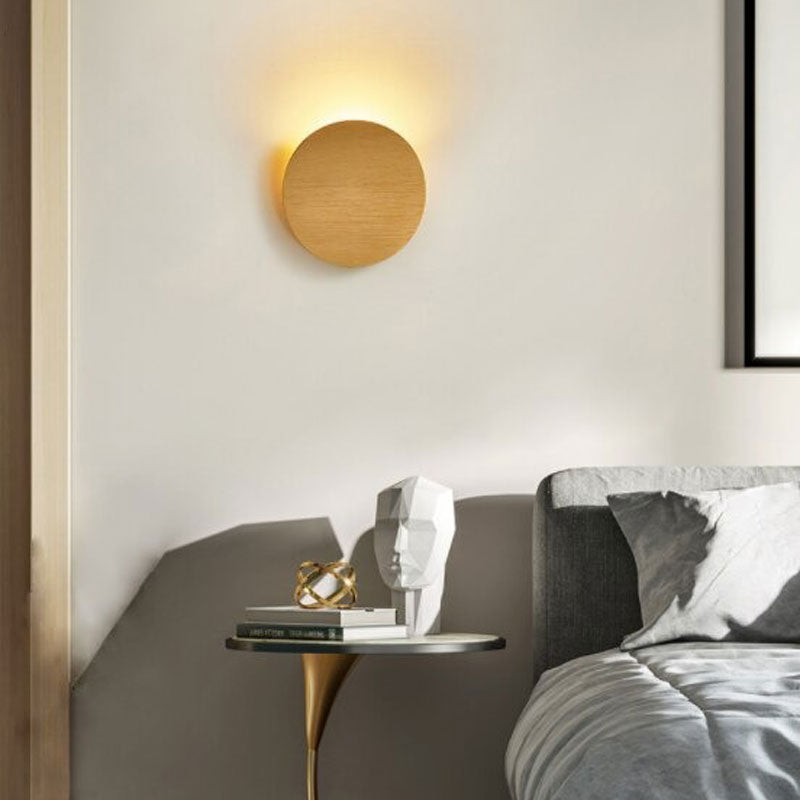 ORLUNE HOME Circular LED Wall Light glows warmly, creating a cozy and inviting atmosphere.