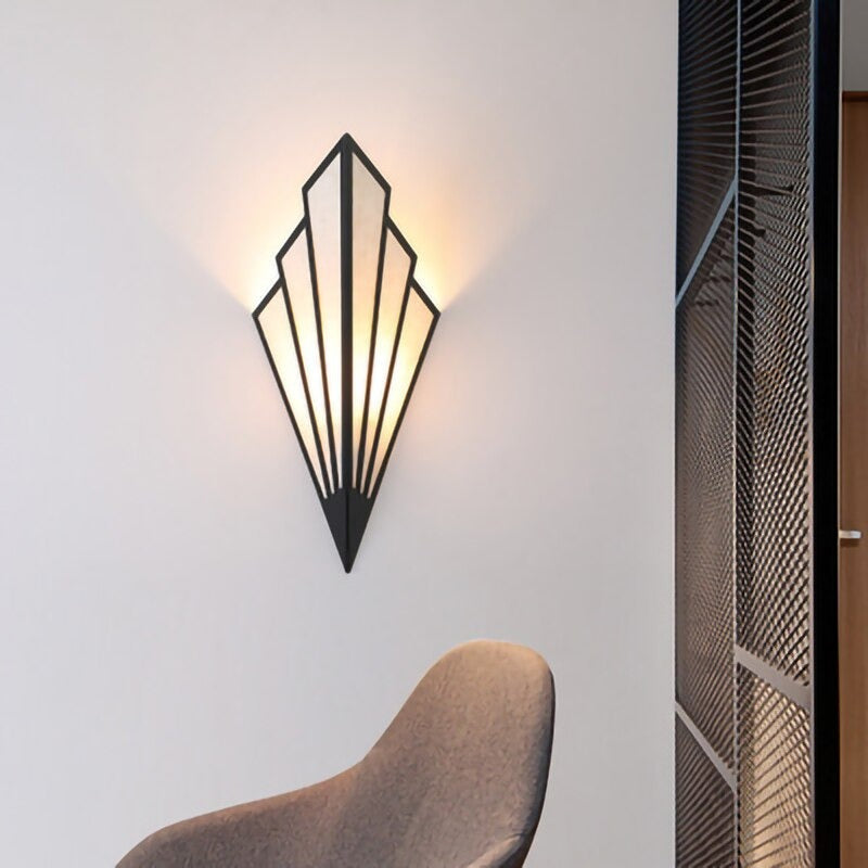 ORLUNE HOME Triangular Wall Light casts striking up and down accent lighting.