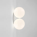 Enjoy soft, modern illumination from two stacked glass globes for striking, contemporary lighting.