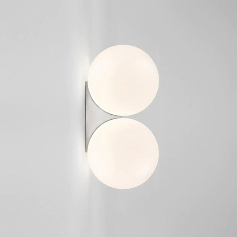Enjoy soft, modern illumination from two stacked glass globes for striking, contemporary lighting.