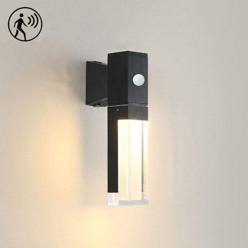 Modern black ORLUNE HOME LED wall light shown glowing, motion sensor icon highlighted.