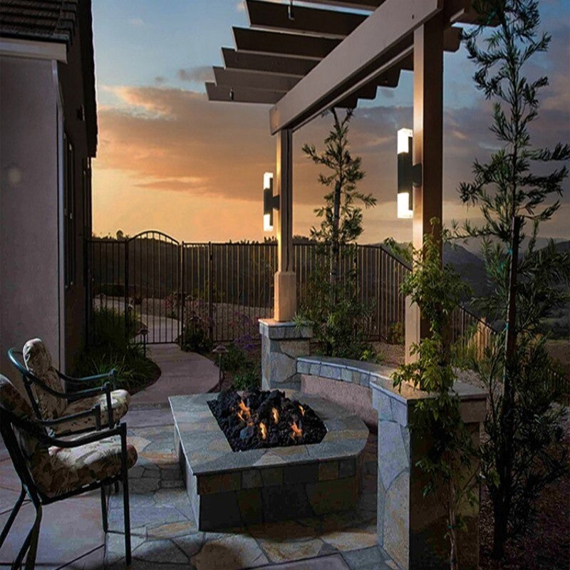 Modern pergola lighting and ORLUNE HOME LED wall lights create stunning nighttime ambiance.