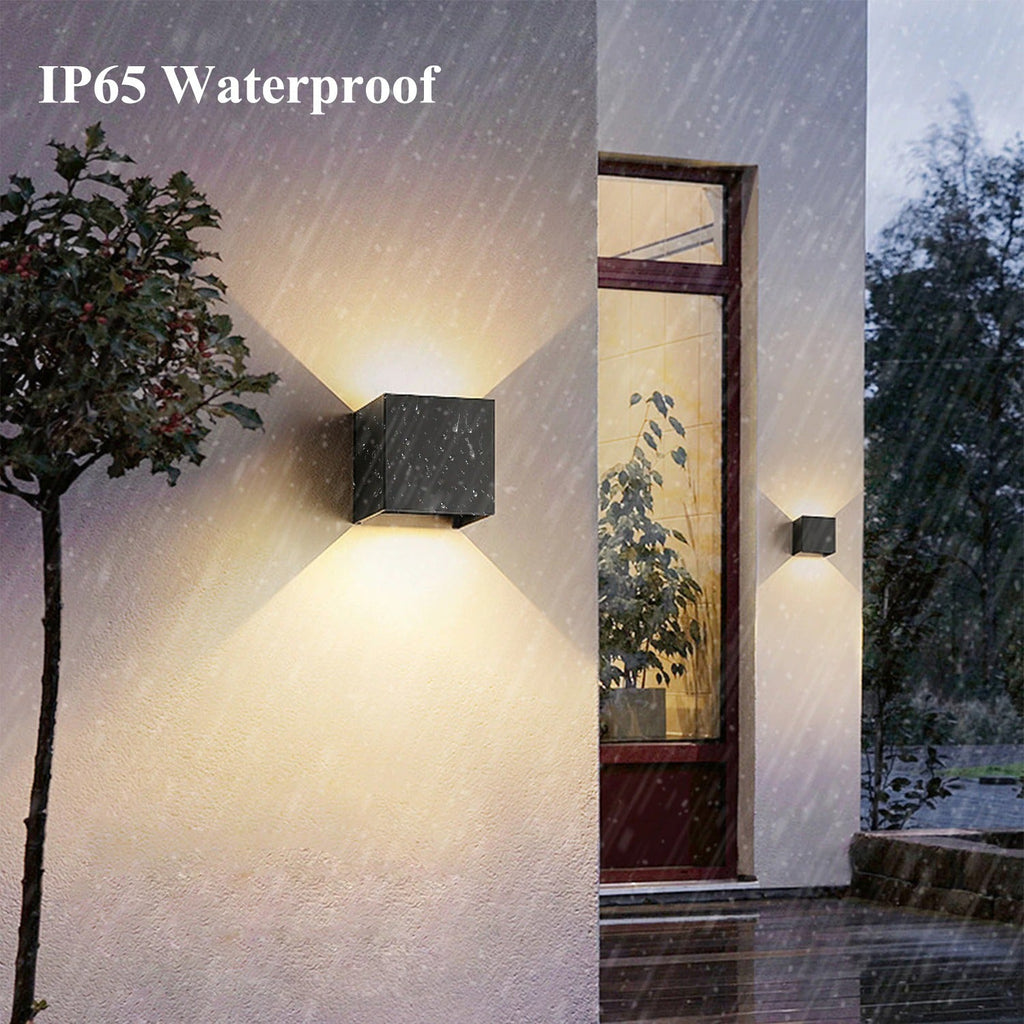 Outdoor LED cube light shines brightly at night, waterproof for reliable, stylish illumination.