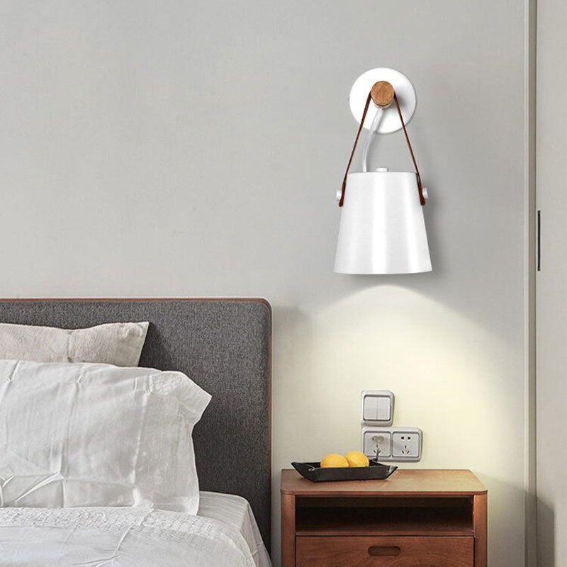 The ORLUNE HOME wall light blends Nordic industrial style with white shade and leather details.
