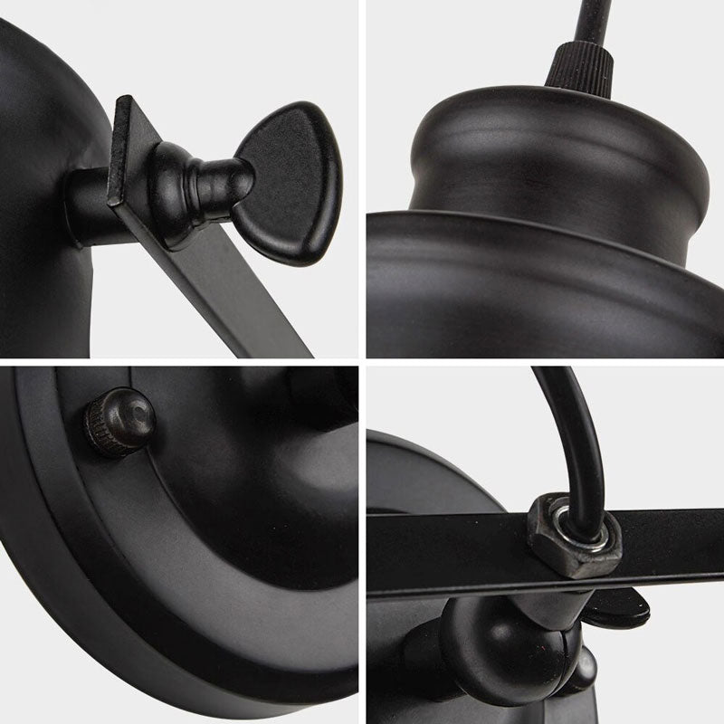 Industrial wall lamp’s black metal shade creates focused, modern lighting—perfect for ambient illumination.