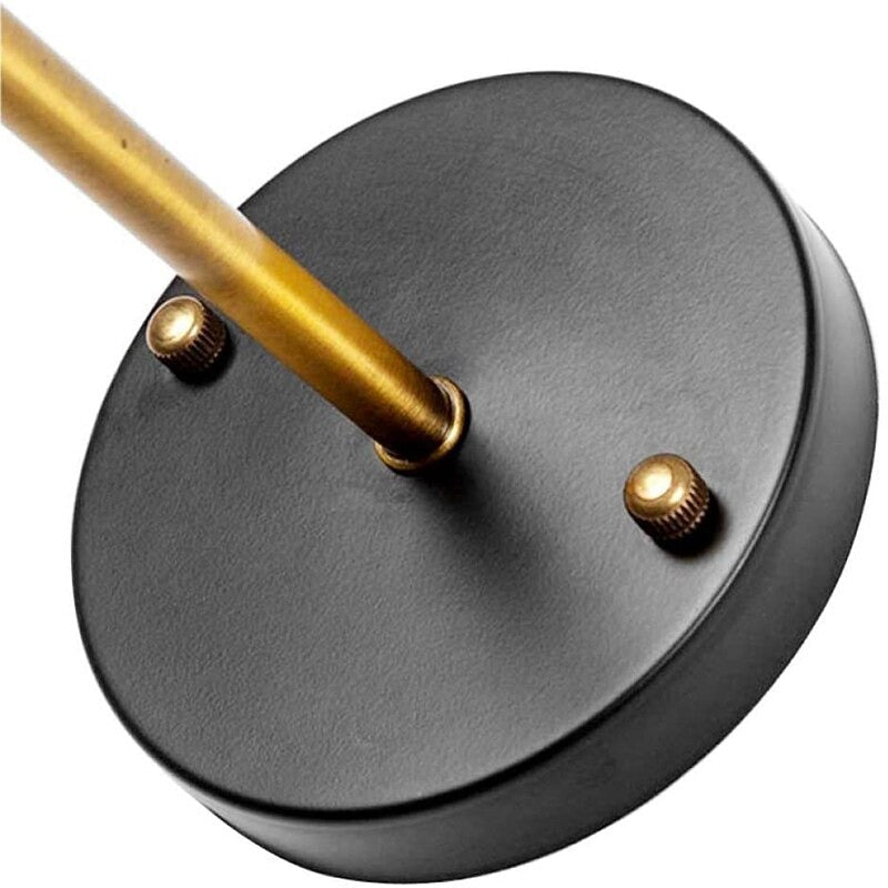 Modern wall light: black base, golden accents; ideal for bright, stylish illumination.