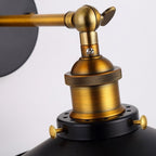 Focused on the unique lighting effect from the ORLUNE HOME wall light’s industrial shade.
